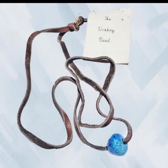 👣4/$20.  The Donkey Bead Necklace with Genuine Brown Leather Cord - Picture 1 of 4